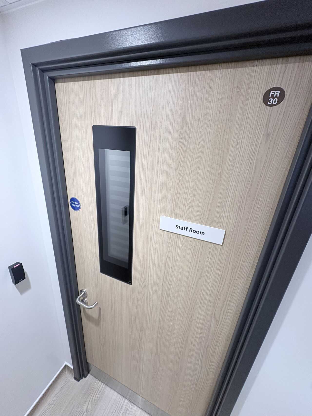 Fire doorset with integrated privacy blind in the vision panel