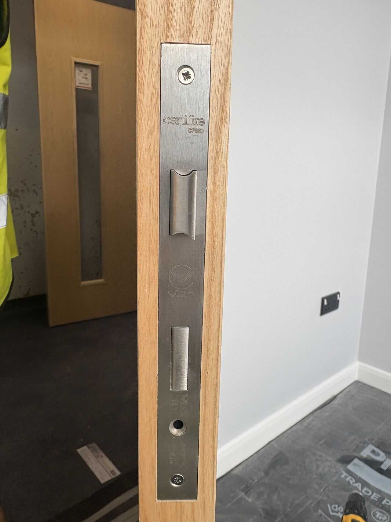 Certified lock and ironmongery detail on an installed doorset, Stoke Damerel